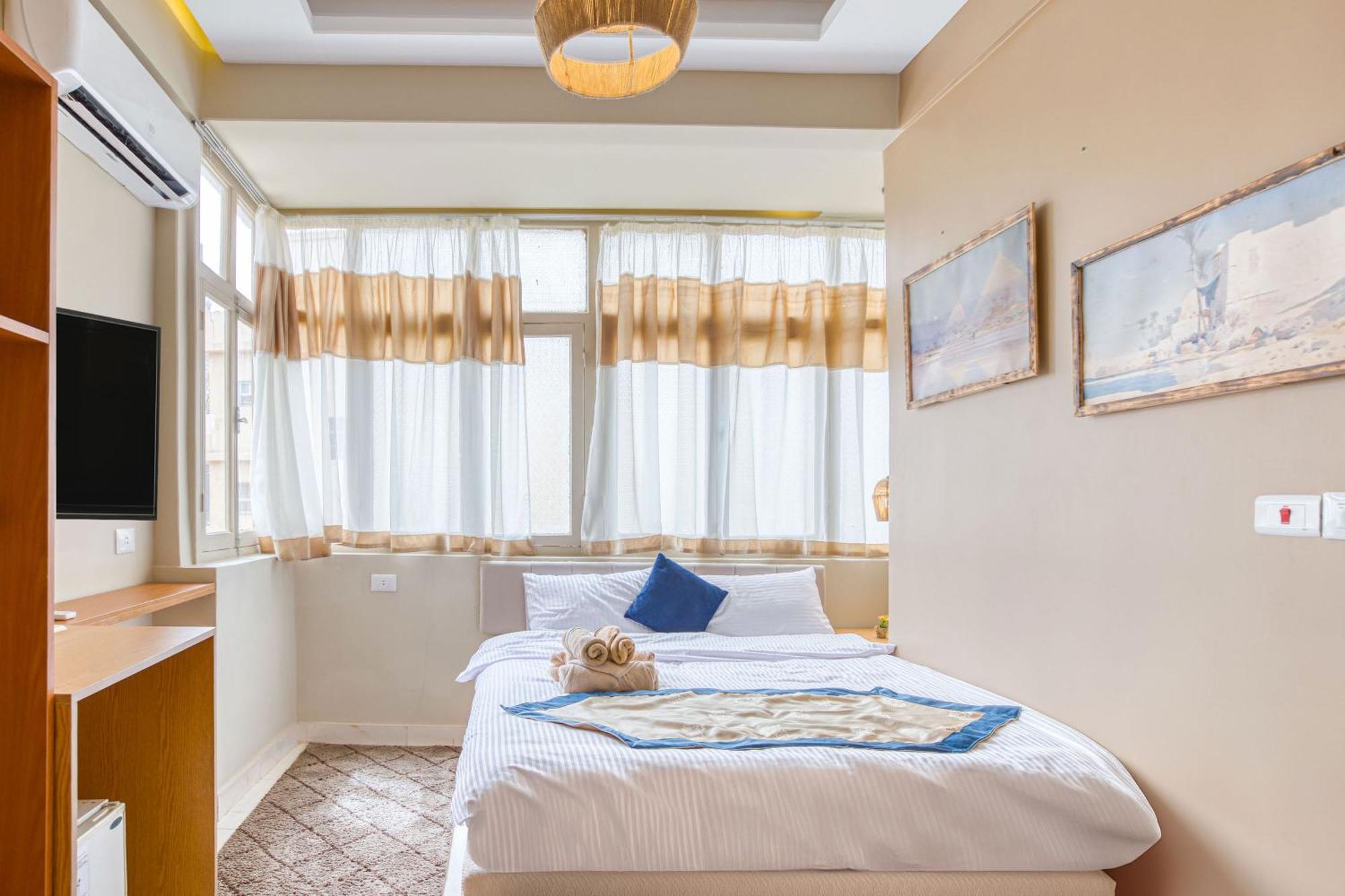 The Grand Pyramids View Hotel Kafret el-Gabal Habitación foto