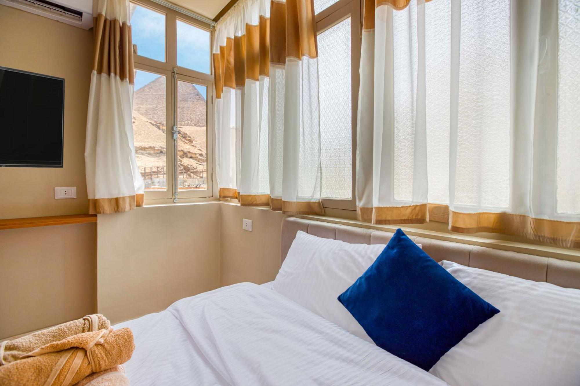 The Grand Pyramids View Hotel Kafret el-Gabal Habitación foto