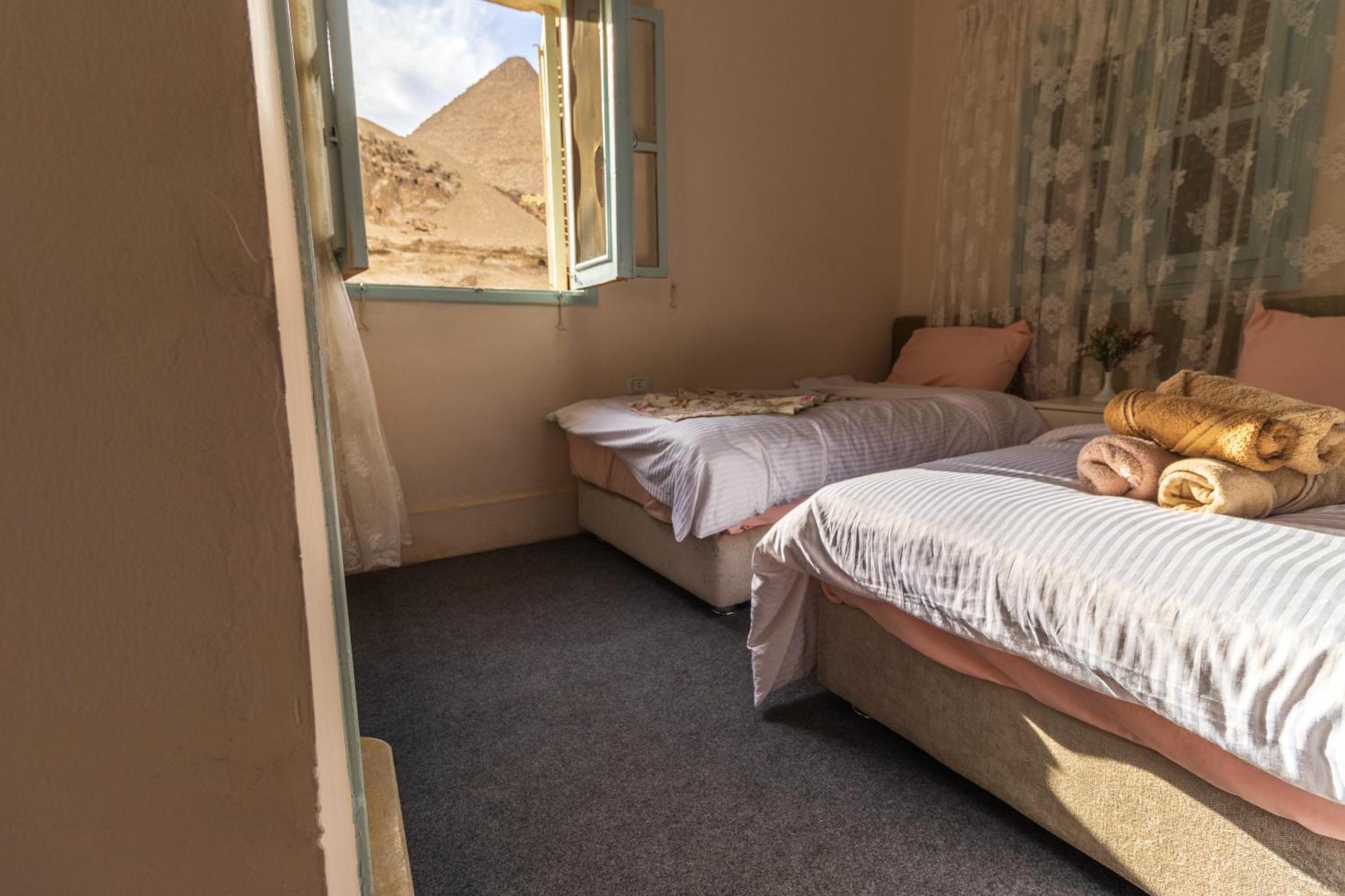 The Grand Pyramids View Hotel Kafret el-Gabal Habitación foto